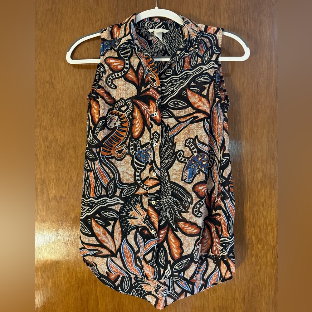 Women’s button up sleeveless blouse